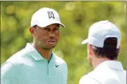 ?? MIKE LAWRIE / GETTY IMAGES ?? Tiger Woods during a practice round at the Northern Trust at Liberty National Golf Club on Wednesday in Jersey City, New Jersey. Woods took it easy on the back nine, citing back stiffness.