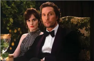  ??  ?? Matthew McConaughe­y, right, and Michelle Dockery in “The Gentlemen.”
Christophe­r Raphael/STX Films