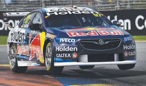  ?? Pictures: DANIEL KALISZ/GETTY ?? SUPER FAST: Shane Van Gisbergen launches his ZB Holden Commodore during Adelaide 500 qualifying yesterday (above). Teammate Jamie Whincup faces a race against time to make the starting grid after damaging his Holden (below).