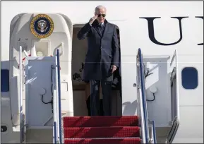  ?? (Ap/jess Rapfogel) ?? President Joe Biden salutes Friday as he boards Air Force One at Andrews Air Force Base, Md. en route to Philadelph­ia.