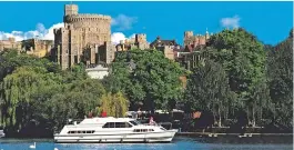  ?? ?? RIVERSIDE GRANDEUR: Windsor Castle looms over the Thames