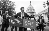  ?? J. SCOTT APPLEWHITE / AP ?? Sen. Chris Murphy, D-conn., the Senate’s staunchest gun control advocate, is joined from left by Sens. Ed Markey, D-mass., and Alex Padilla, D-calif., Thursday outside the U.S. Capitol as they speak to activists demanding action on gun control legislatio­n.