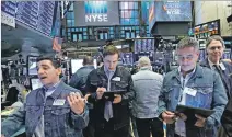  ?? BRENDAN MCDERMID/ REUTERS ?? Bolsa. Los pantalones Levi’s regresan a Wall Street a los 34 años.