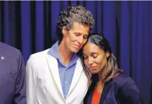  ?? MATT SLOCUM/ASSOCIATED PRESS ?? Bill Cosby accuser Andrea Constand embraces prosecutor Kristen Feden, right, during a news conference after Cosby was found guilty in his sexual assault trial on Thursday in Norristown, Pa.