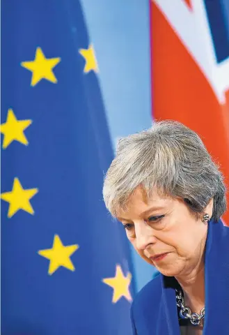  ?? DYLAN MARTINEZ/REUTERS ?? Reino Unido. Theresa May agora precisa de 320 votos para aprovar o texto, tarefa árdua