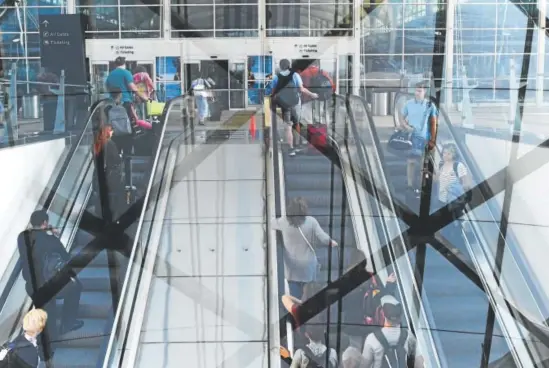  ?? Photos by RJ Sangosti, The Denver Post ?? The Great Hall project at Denver Internatio­nal Airport would account for fast-growing traffic that reached 58.3 million passengers last year, making the Jeppesen Terminal capable of handling 80 million a year.