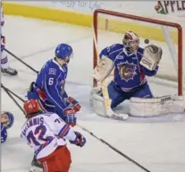  ?? GARY YOKOYAMA, THE HAMILTON SPECTATOR ?? Hamilton goalie Kaden Fulcher has one get by him in the third period Monday against the Kitchener Rangers. But, the Bulldogs hung on for a 5-4 win.