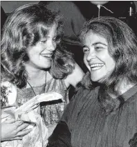  ?? AP PHOTO ?? In this May 21, 1979 file photo, feminist activist Kate Millett, right, laughs, during a surprise birthday party for her niece, Kristan Vigard, in New York.