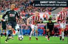  ??  ?? SWEET SPOT: Stanislas puts Bournemout­h two ahead