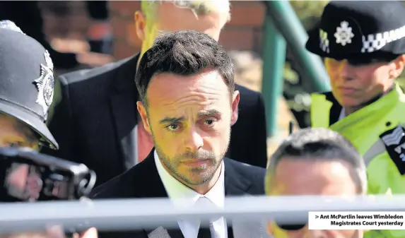  ??  ?? > Ant McPartlin leaves Wimbledon Magistrate­s Court yesterday