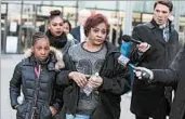  ?? TERRENCE ANTONIO JAMES/CHICAGO TRIBUNE ?? Prisilla Covington, grandmothe­r of suspects Brittany Covington, 18, and Tanishia Covington, 24, is seen outside bond court Friday in Chicago. Two men are also charged.