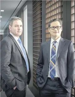  ?? TYLER ANDERSON / NATIONAL POST ?? Jonathan Norwood, left, and Richard Wong manage the Mackenzie Cundill Value Fund.