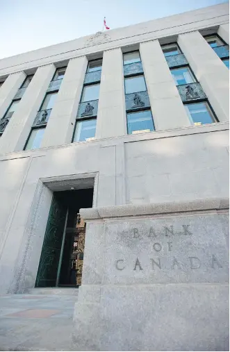  ?? GEOFF ROBINS/AFP/GETTY IMAGES ?? Citing weak wage growth and the slowing pace of underlying inflation, the Bank of Canada stuck with its trendsetti­ng interest rate of 0.5 per cent on Wednesday.