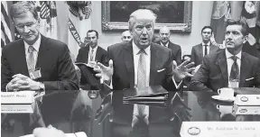  ?? AP ?? President Donald Trump speaks while hosting a breakfast with business leaders at the White House yesterday. At left is Wendell P. Weeks, chief executive officer of Corning. At right is Alex Gorsky, chairman and chief executive officer of Johnson &...