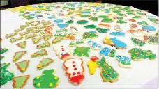  ?? Lynn Atkins/The Weekly Vista ?? Although there dozens of typse of cookies, decorated cookies, like these sugar cookies, always go first, according to organizers of the annual Cookie Walk at Highlands Church.