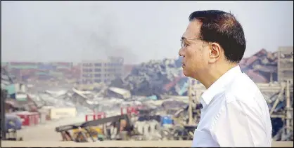  ?? REUTERS ?? Chinese Premier Li Keqiang visits the site of the explosions in Tianjin yesterday.