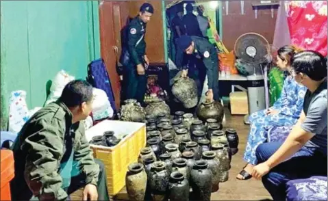 ?? POLICE ?? A Vietnamese fisherman was arrested in Sihanoukvi­lle on September 17 for possessing 281 ancient vases he found at the bottom of the sea. Experts believe the vases may date to between the 15th and 17th centuries.