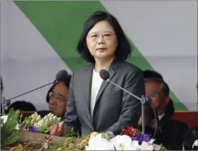  ??  ?? In this Oct. 10 file photo, Taiwan’s President Tsai Ing-wen delivers a speech during the National Day celebratio­ns in front of the Presidenti­al Building in Taipei. Taiwan’s President Tsai is setting off for the United States and three South Pacific...