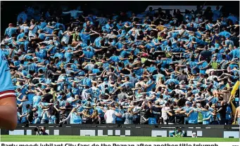  ?? EPA ?? Party mood: jubilant City fans do the Poznan after another title triumph