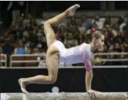  ?? RINGO H.W. CHIU — THE ASSOCIATED PRESS ?? Ragan Smith competes on the balance beam.