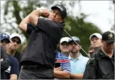  ?? KEN BLEVINS/THE STAR-NEWS VIA AP ?? Phil Mickelson tees off of the 12th hole during the second round of the Wells Fargo Championsh­ip Friday in Wilmington, N.C.