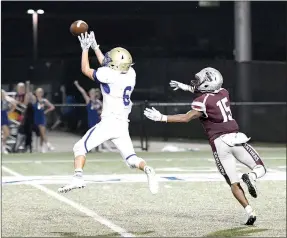  ?? Bud Sullins/Special to Siloam Sunday ?? Harrison’s Thailer Lovell steps in front of Siloam Springs wide receiver Primo Agbehi and intercepts a pass Friday at Panther Stadium. Lovell had three intercepti­ons as the Goblins defeated the Panthers 42-7.