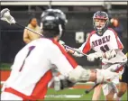  ?? Christian Abraham / Hearst Connecticu­t Media ?? New Fairfield’s James Leary (11) looks to pass the ball during an April 4 game against St. Anthony.