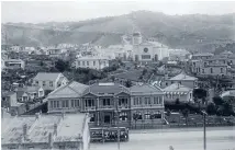  ?? Photo: ALEXANDER TURNBULL LIBRARY/REF 1/1-020033-G ?? Local landmark: A 1910 photo overlookin­g Newtown from Riddiford St towards St James Presbyteri­an Church.