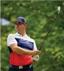  ?? ANDY LYONS / GETTY IMAGES ?? Gary Woodland rallied after a careless bogey on the opening hole and finished the first round of the PGA Championsh­ip in St Louis with a one-stroke lead over Rickie Fowler.