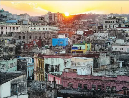  ??  PHOTOS: SARAH L. VOISIN/WASHINGTON POST ?? The Central Havana skyline opens up from a rooftop in Old Havana. In the crowded city, where housing is in short supply, the rooftops offer residents options to find a bit more breathing room ... and some great views.