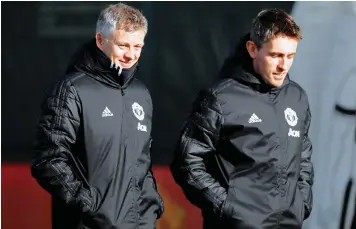  ?? | Reuters ?? MANCHESTER United interim manager Ole Gunnar Solskjaer and assistant coach Kieran McKenna during training yesterday.