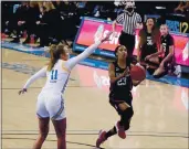  ?? MARCIO JOSE SANCHEZ — THE ASSOCIATED PRESS ?? Stanford guard Kiana Williams (23) drives past UCLA forward Emily Bessoir during the first half Monday in Los Angeles.