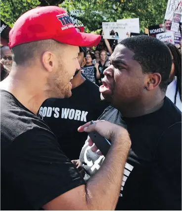  ?? JIM WATSON / AFP / GETTY IMAGES ?? Protesters clash near the U.S. Capitol on Thursday in Washington.