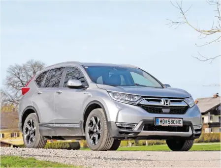  ?? BILDER: SN/BEHR (2) ?? Antrieb je nach Geschmack: der Honda CR-V Hybrid.