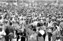  ??  ?? PNP supporters outside the National Arena as they make their way inside for the party’s 80th anniversar­y national conference last September.