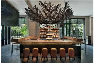  ?? ?? From left: The interiors of ADRIFT Kaya have been designed like a traditiona­l Japanese izakaya but with a contempora­ry twist; chef David Myers.