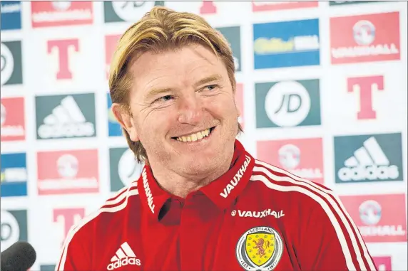  ??  ?? PLENTY TO SMILE ABOUT: Scotland coach Stuart McCall says the young players who have come into the squad have a real chance to stake a claim