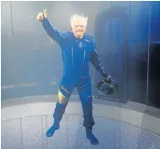  ?? Picture: REUTERS/ MIKE SEGAR ?? FREQUENT FLYER: Sir Richard Branson appears in a skydiving simulator as he wears Virgin Galactic's new space-wear suit in Yonkers, New York, on Wednesday.