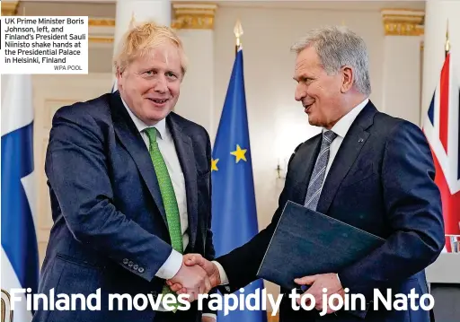  ?? WPA POOL ?? UK Prime Minister Boris Johnson, left, and Finland’s President Sauli Niinisto shake hands at the Presidenti­al Palace in Helsinki, Finland