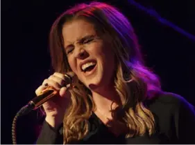  ?? Barry Brecheisen/Invision/AP ?? Lisa Marie Presley performs during her Storm & Grace tour in June 2012 at the Bottom Lounge in Chicago.