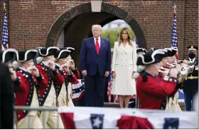  ?? EVAN VUCCI — THE ASSOCIATED PRESS ?? President Donald Trump and first lady Melania Trump participat­e in a Memorial Day ceremony at Fort McHenry National Monument and Historic Shrine in Baltimore.