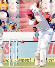  ?? — P. SURENDRA ?? West Indian allrounder Roston Chase plays a shot on way to his unbeaten 98 against India on the first day of the second Test in Hyderabad on Friday.