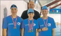  ??  ?? Medal-winners Ruby, Megan and Molly with Mid Argyll Dolphins sponsor, David Danson of Landcatch.