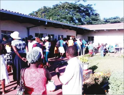 ??  ?? Voting in some parts of Zvishavane started in the afternoon. Aspiring voters who sought to vote while wearing their preferred candidates’ T-shirts were ordered to take them off to allow for a smooth voting process