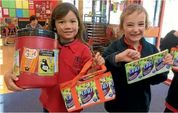  ??  ?? Children from St Mark’s Preschool in Wellington take part in the Fonterra pouch recycling programme.