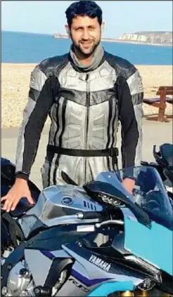  ??  ?? Enthusiast: Ashar Niazi with the motorcycle on which he died