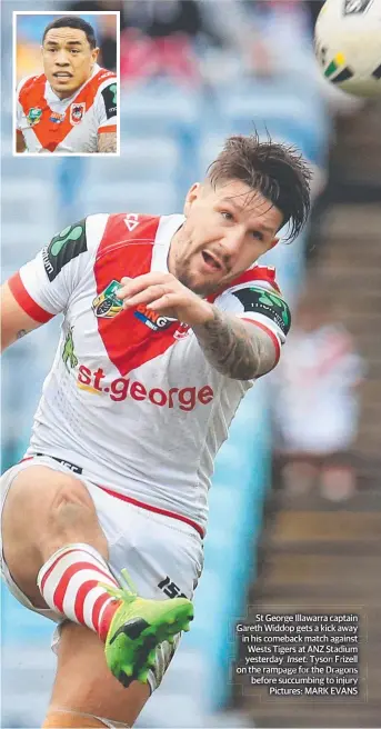  ??  ?? St George Illawarra captain Gareth Widdop gets a kick away in his comeback match against Wests Tigers igers att at t ANZ ANANZ Stadium yesterday. Tyson Frizell on the rampage for the Dragons before succumbing to injury Pictures: MARK EVANS