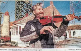  ??  ?? A clipping of a Hamilton Spectator photo from Jan. 7, 1985, showing Pete in his element outside the lighthouse keeper’s cottage where he lived.