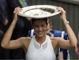  ?? FOTO AP ?? Voor de Spaanse Muguruza is het haar tweede grandslamt­itel.