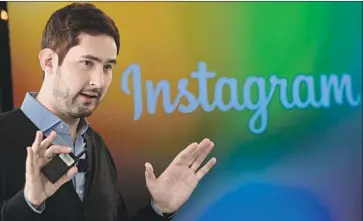  ?? Emmanuel Dunand AFP/Getty Images ?? KEVIN SYSTROM, shown in 2013, and Instagram co-founder Mike Krieger are ready for their next chapter.